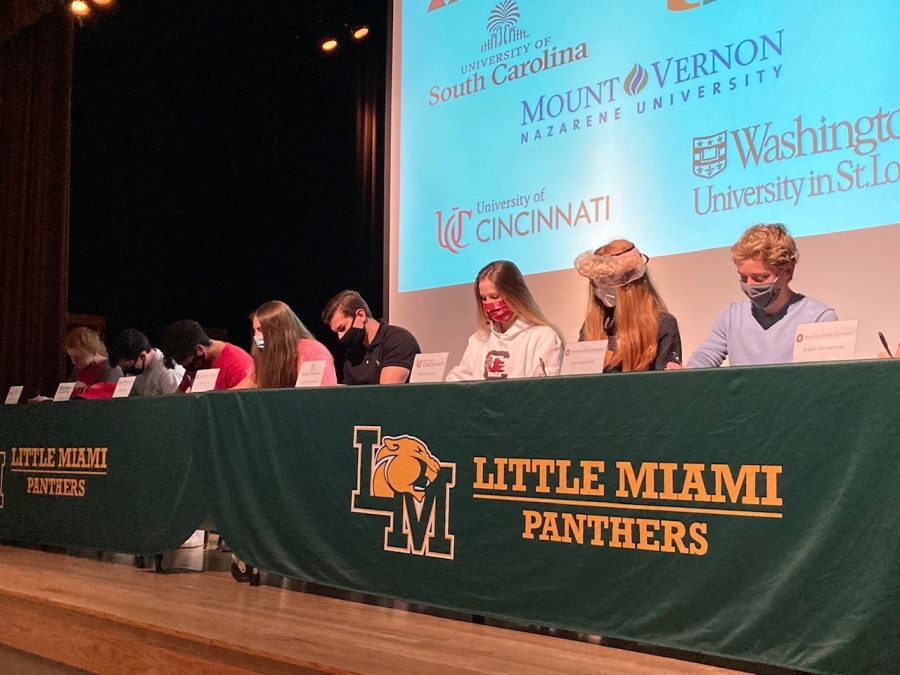Top Ten Academic Seniors signing their college commitments 